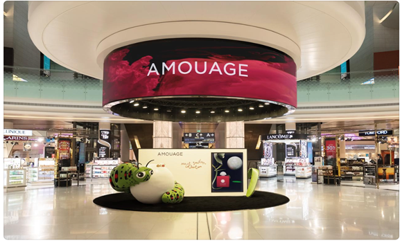 A large stuffed animal in a mall
Description automatically generated