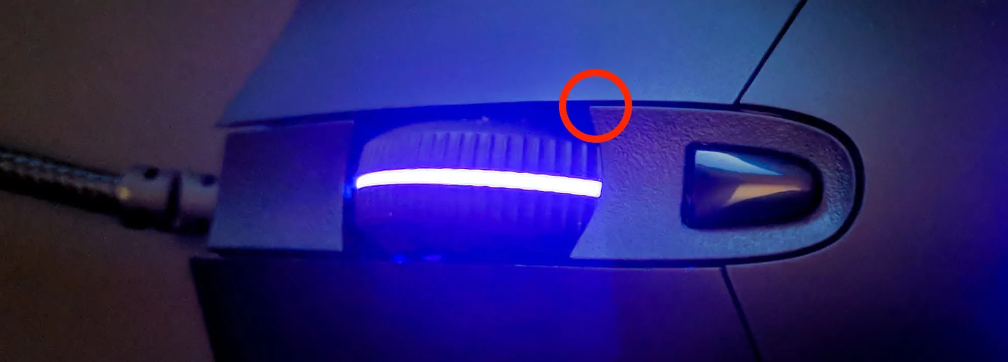 Protruding edge at the end of the scroll wheel shaft on the Logtech G403