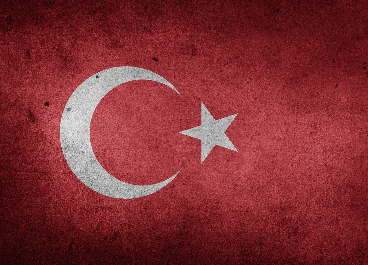The flag of Turkey painted on concrete.