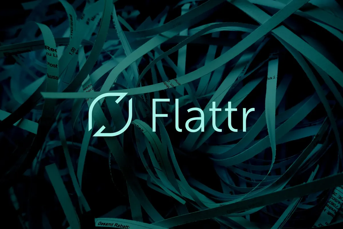 The Flattr logo hovering in front of some shredded papers in the background.