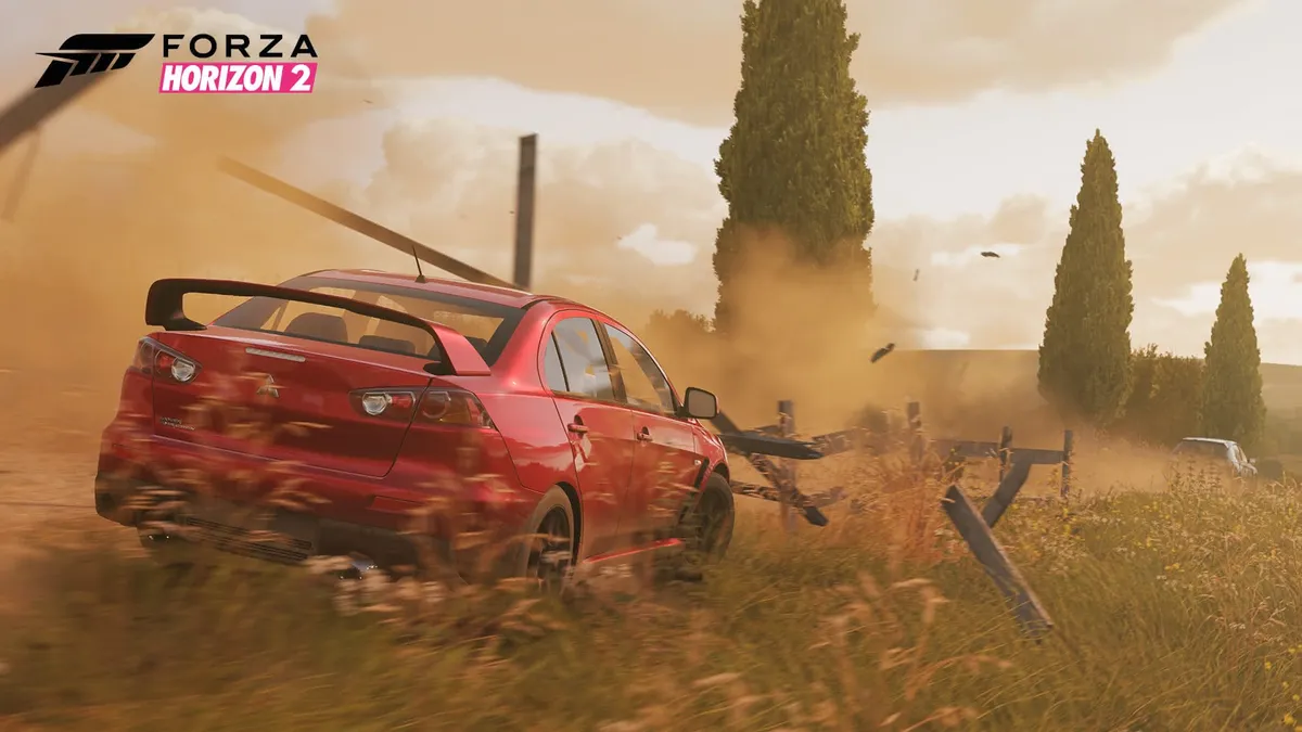 A red car smashes through a fence. Captioned “Forza Horizon 2”.