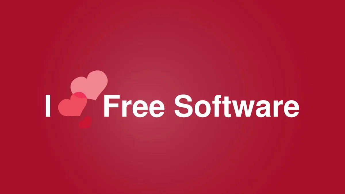 Large letters stating “I LOVE FREE SOFTWARE” with hearts substituting the word “love”.