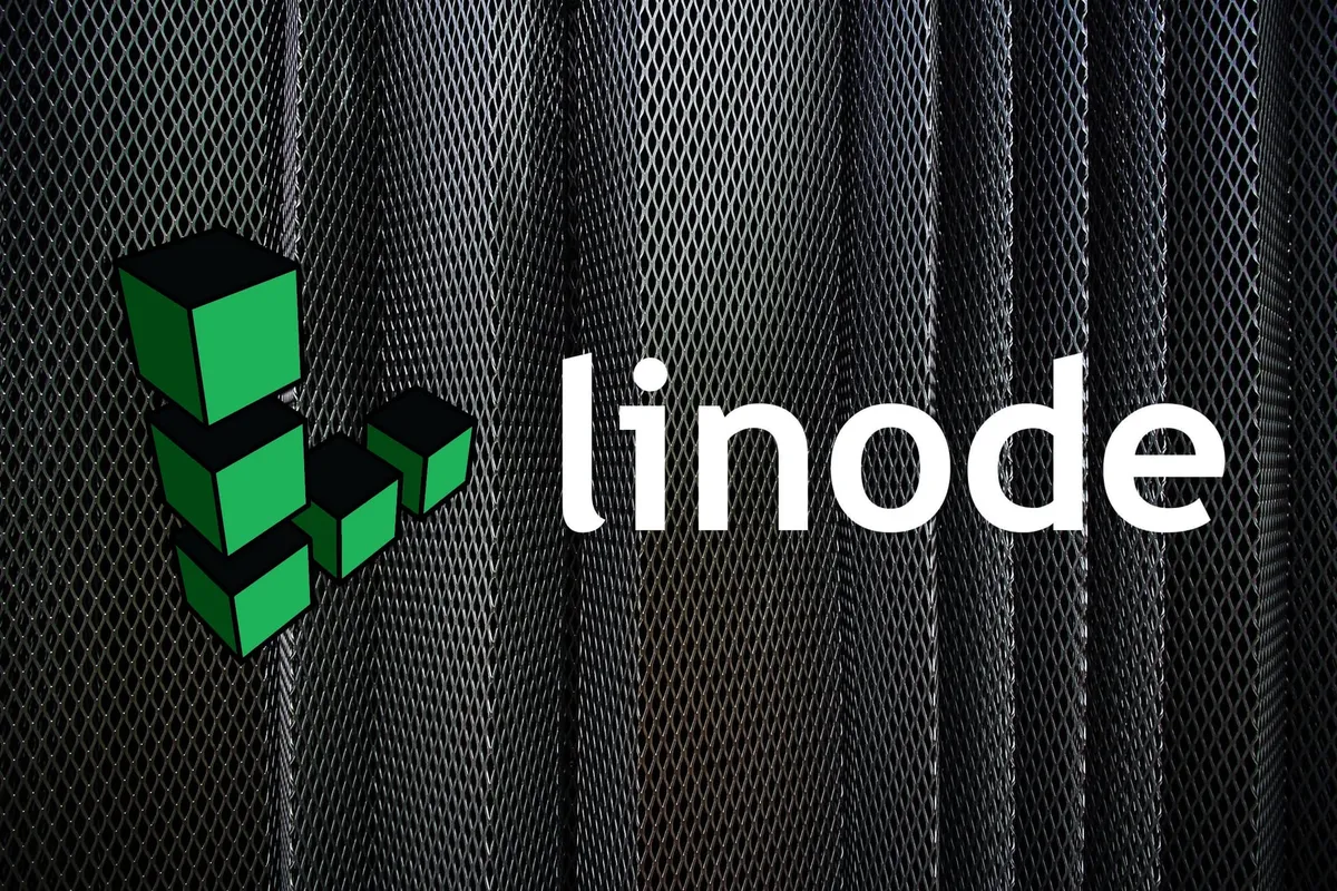 The Linode logo with some metal sheets in the background.