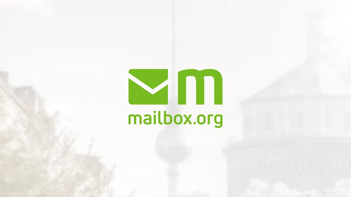 The Mailbox.org logo with a blurred photo of the Berliner Fernsehturm in the background.
