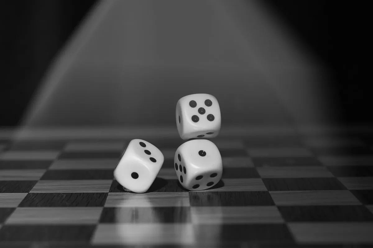 Rolling dice.