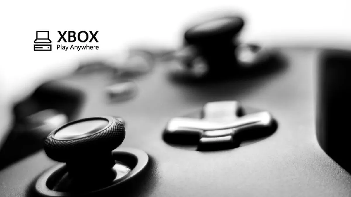 The Xbox Play Anywhere logo with an Xbox One Controller in the background.