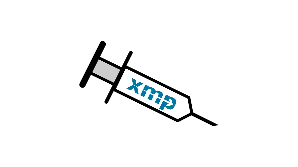 A syringe labled “XMP”.
