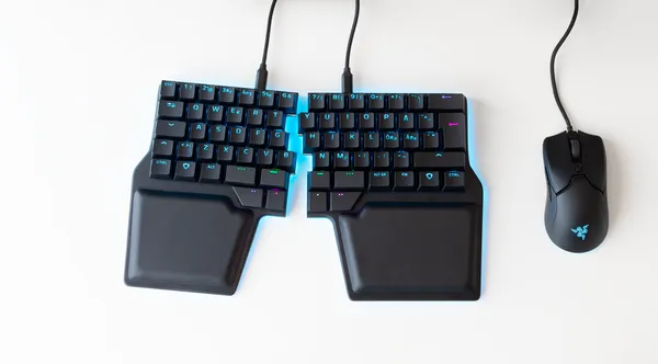 A keyboard physically split down the middle forming two separate boards; one for each hand.