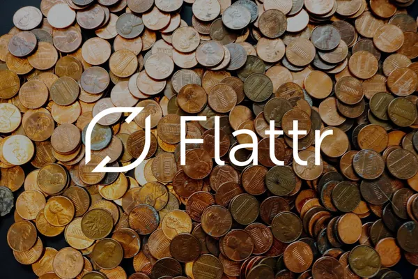The Flattr logo in front of a pile of coins.