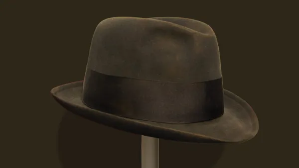 A fedora in a museum.