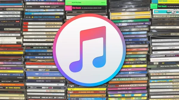 The iTunes app logo in front of a large collection of music CDs.