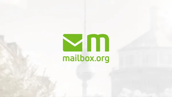 The Mailbox.org logo with a blurred photo of the Berliner Fernsehturm in the background.