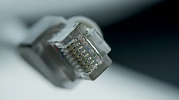 A close-up of an Ethernet RJ45 cable connector.
