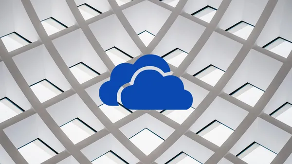 The OneDrive logo in front of an abstract background featuring a grid of compartments.