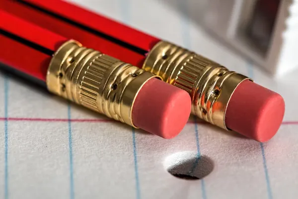 The eraser-end of two pens.