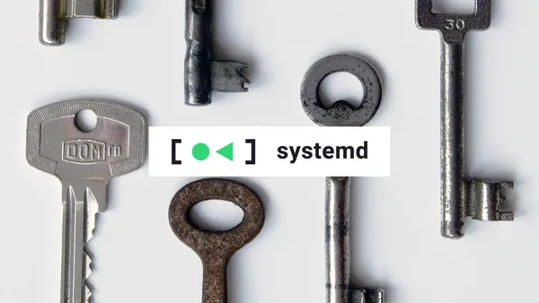 A selection of miscellaneous door keys with the systemd logo in front.