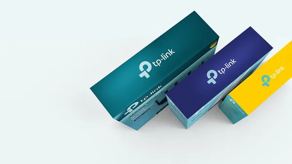 Three different packaged boxes with TP-Link products.