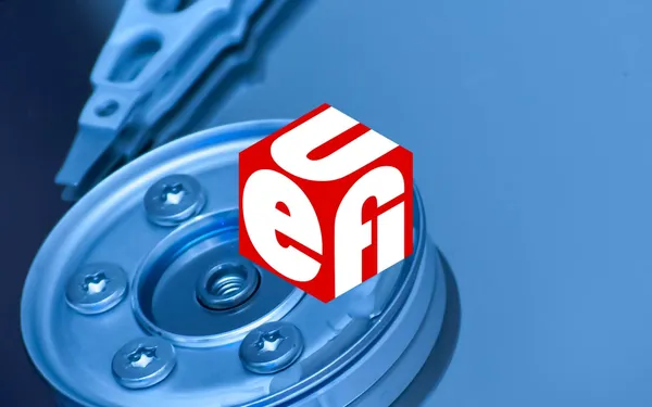 The UEFI logo against a close-up of a hard drive’s internals.