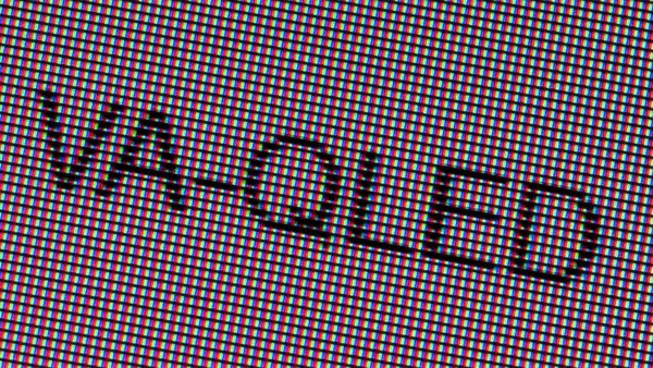 A close-up photo of the word “VA-QLED” on a VA-QLED display panel.