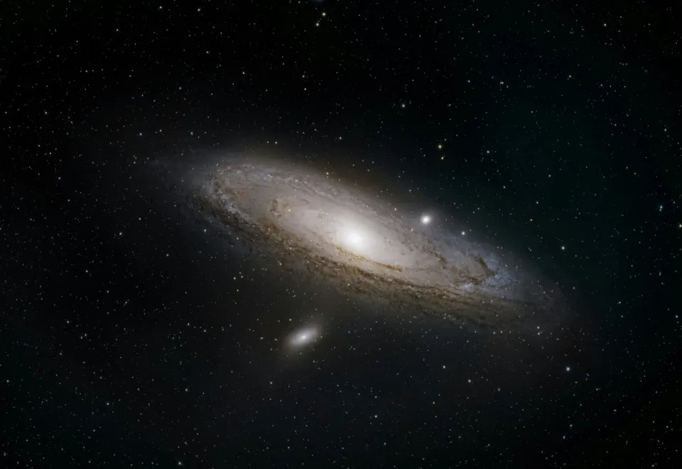 Andromeda galaxy with dense star field and spiral structure in deep space.