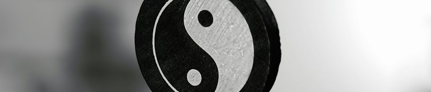 Standing with Hands on the Heads of Two Tigers