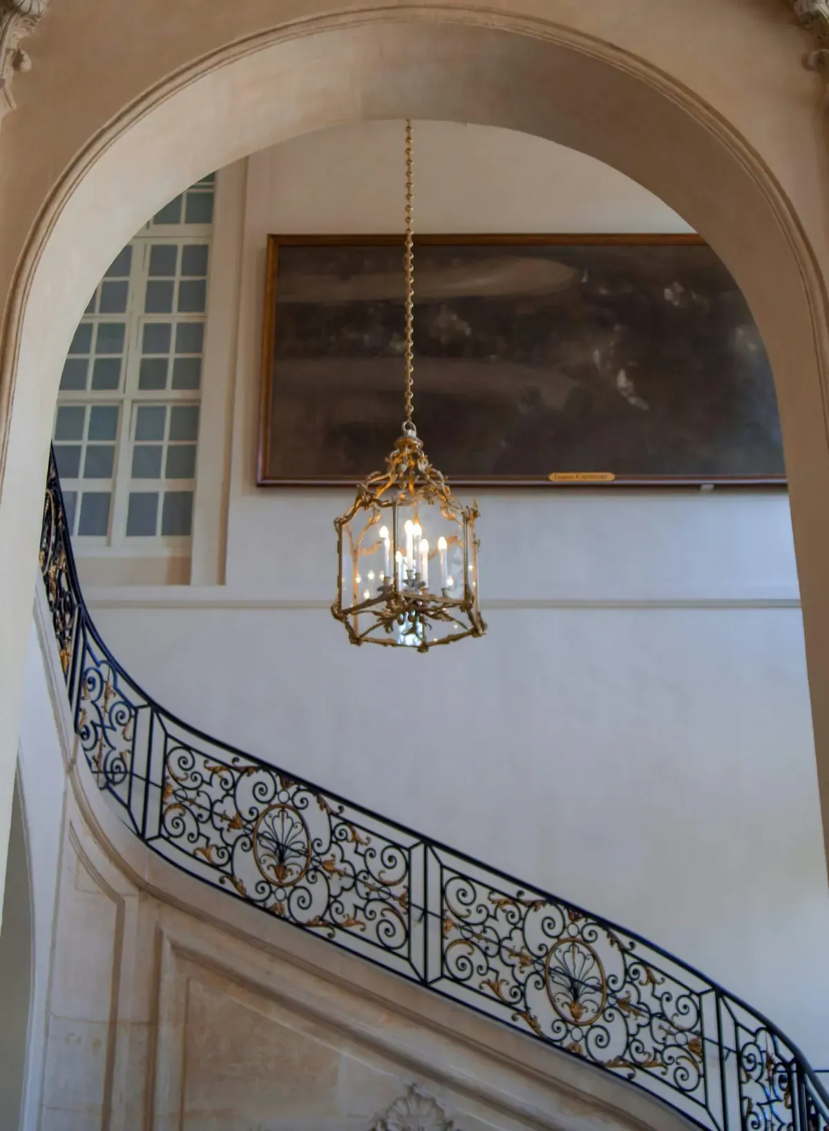 gold and white pendant lamp