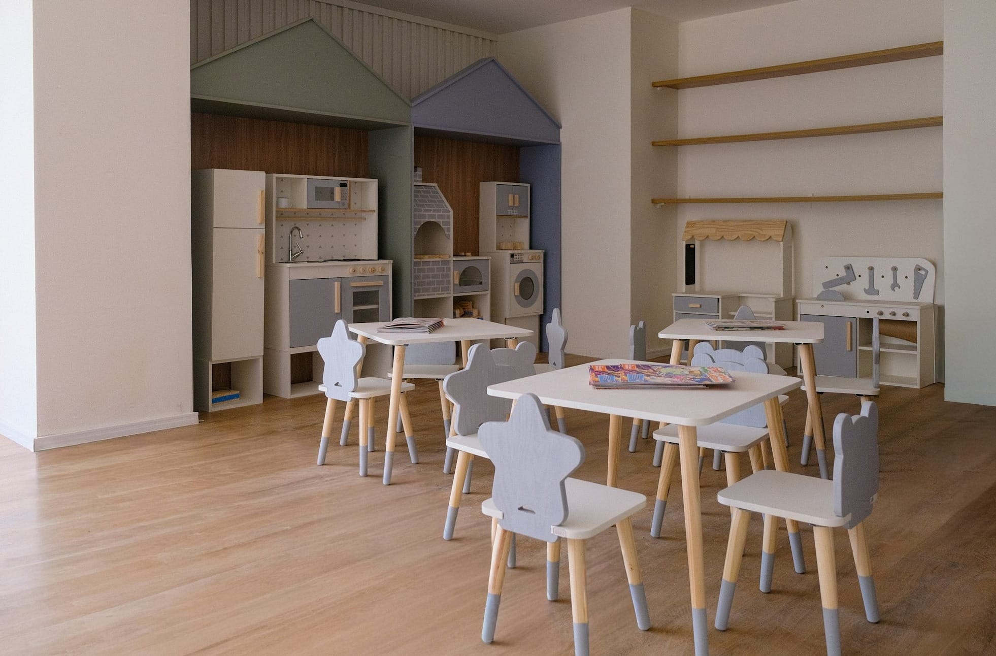Children's playroom with small tables and chairs