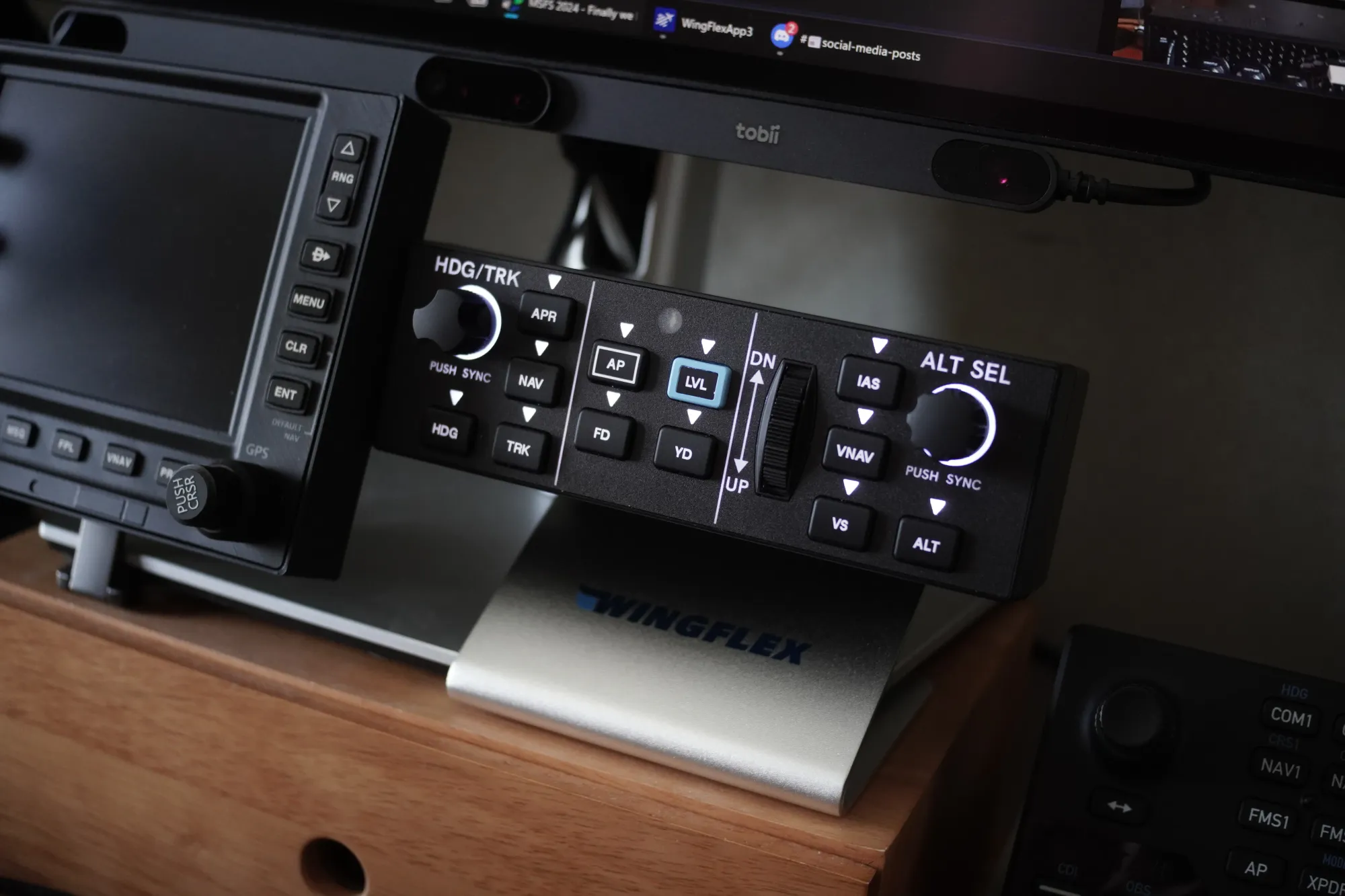 Close-up of the WingFlex DAP 500 control panel showing the labeled GFC 500-style button grid and encoders