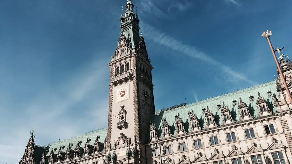Why some buildings in Hamburg have a greenish roof?