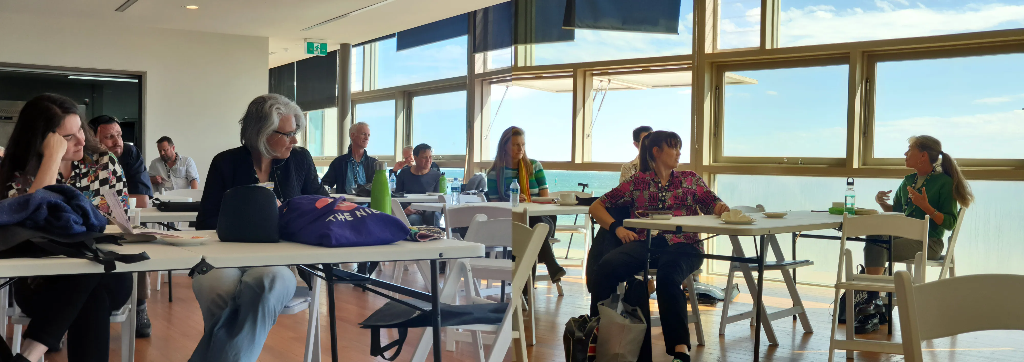 Photo of people seated and listening at the 2023 Stanleys conference in St Kilda.
