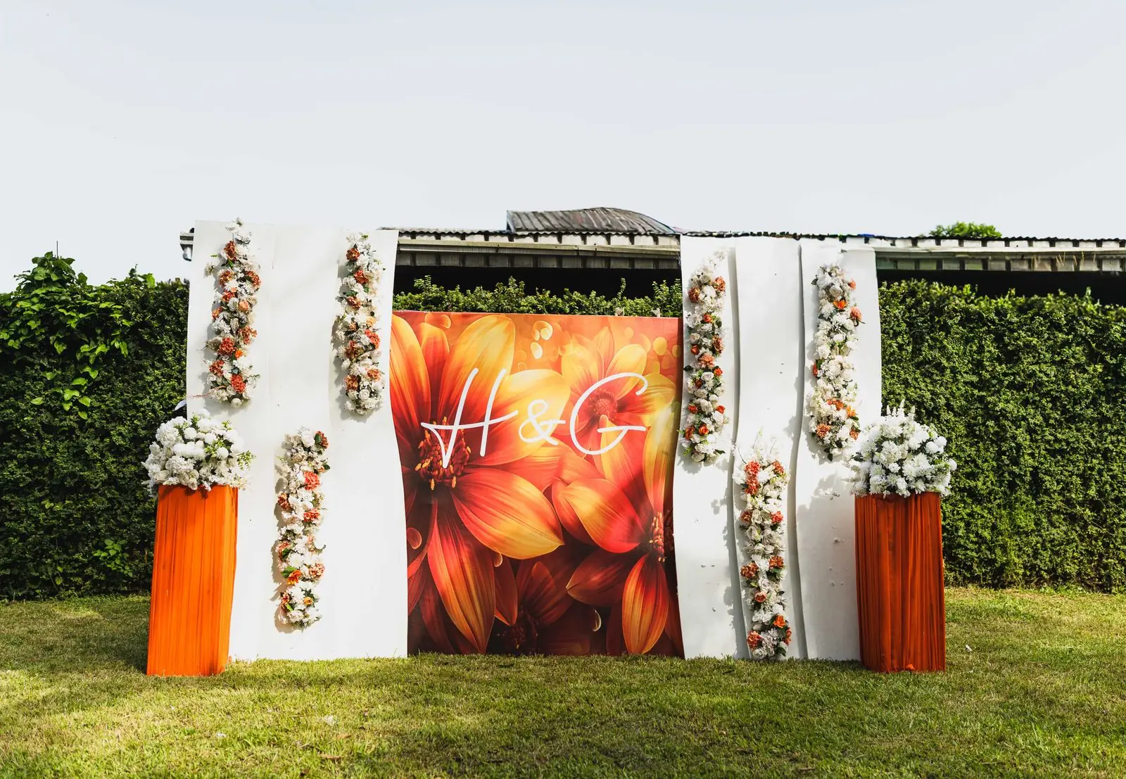 Beautifully decorated wedding table with candles and greenery at a stylish indoor venue.