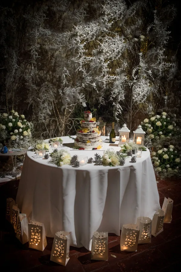 Beautiful winter wedding cake setup with elegant decor in Como, Italy.