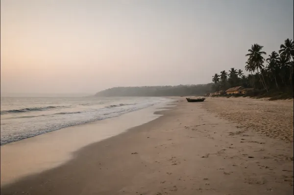 Quiet beach in Goa during soft daylight, showing a calm setting ideal for thoughtful travel planning.