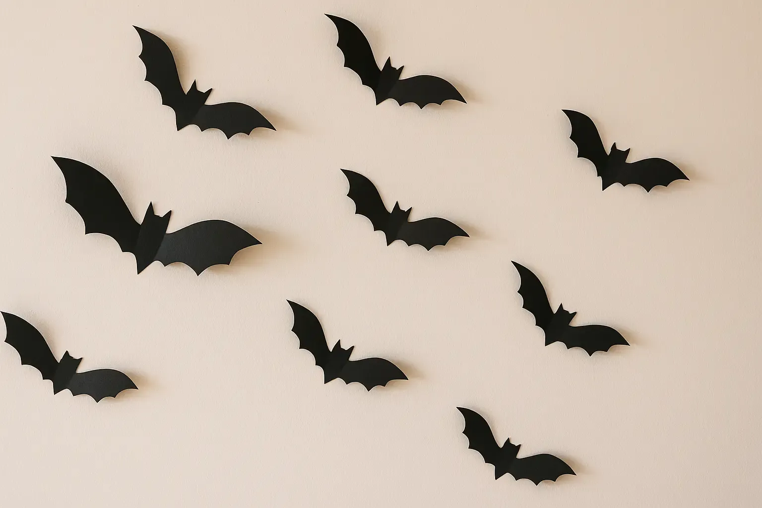 diy halloween decorations on a budget – paper bats on wall