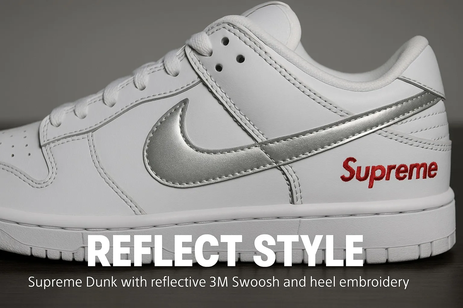 White Supreme Dunk close-up with reflective detailing