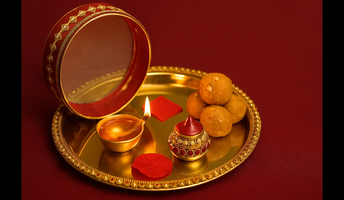 Karwa Chauth puja thali with diya and sieve