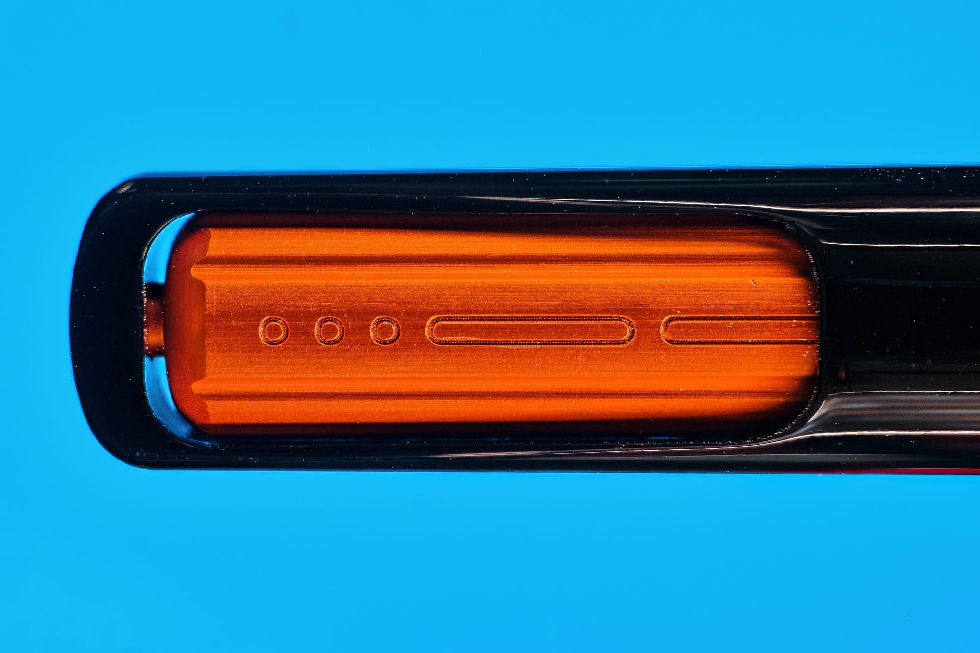 Close up of the Endless Captiva's orange piston knob