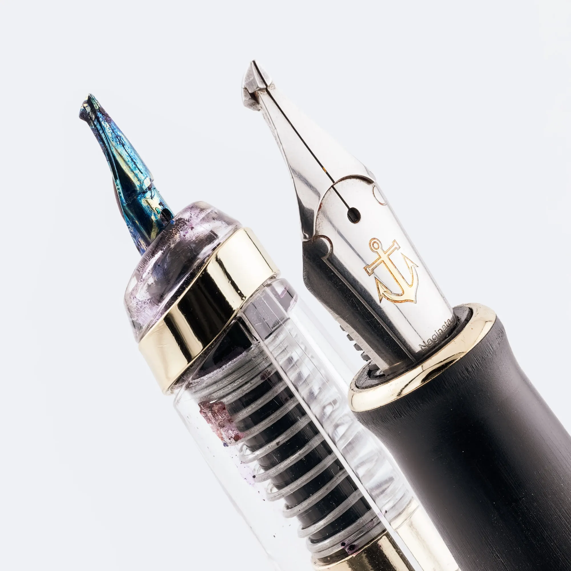 Close-up photo of the stacked nibs on an Endless Phantom and Tangmoon D6
