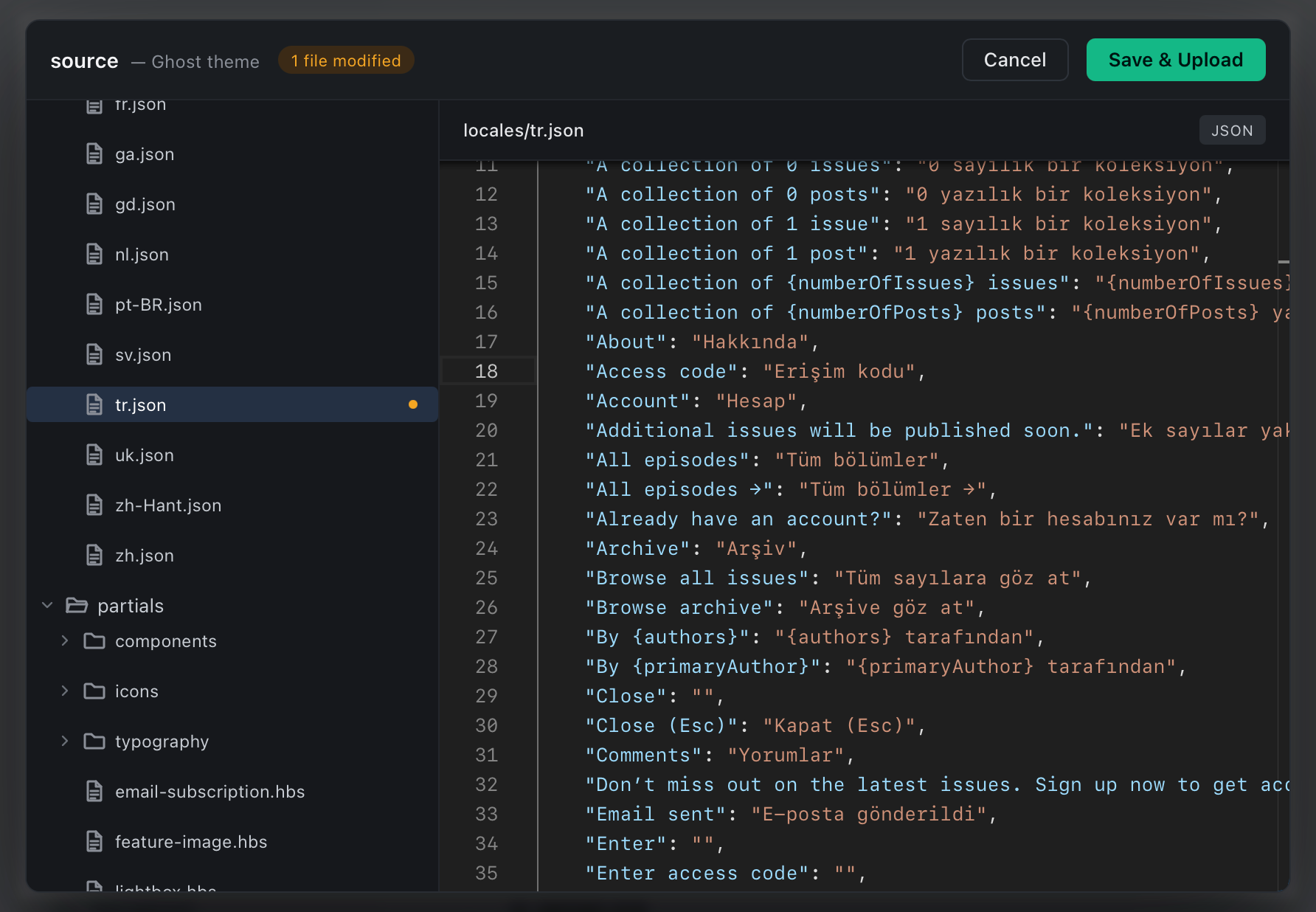 Screenshot of Ghost Theme Editor, showing an edited tr.json file with a syntax highlighted code editor