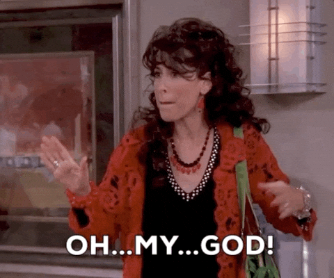 A GIF of Maggie Wheeler, as Janice, making an emphatic hand gesture and saying "oh ... my ... god!"
