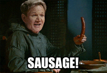 A GIF of Gordon Ramsay holding a wriggling hot dog with the caption "Sausage!"