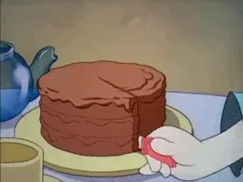 Short cartoon clip of disembodied hands cutting out a slice of cake, then lifting up and taking the entire cake minus the slice