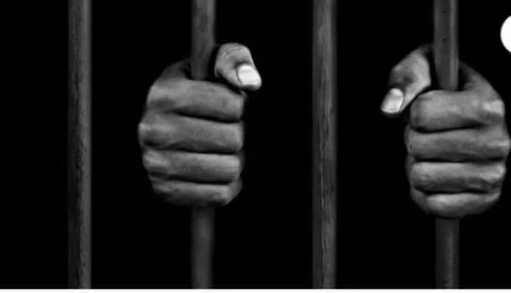 Homme en prison