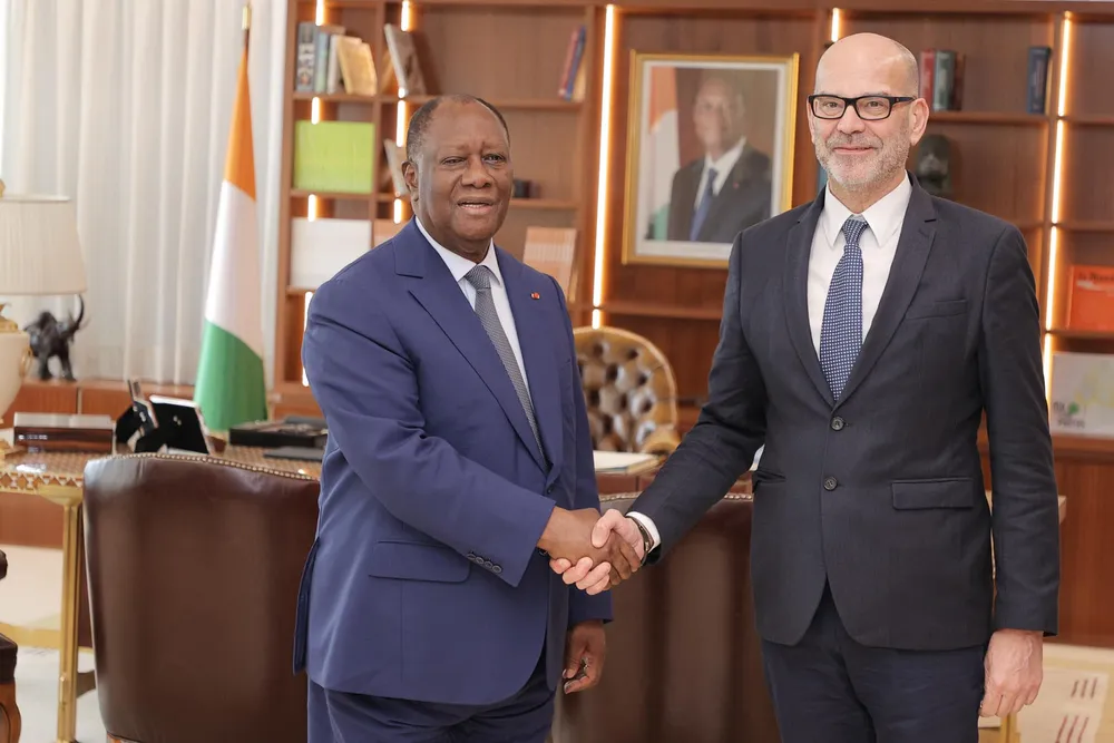 Le Président de Canal+ International, Jaques Dupuy, chez le Président Ouattara