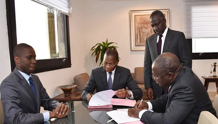 Bruno Koné et Adama Bictogo lors de la signature de l'accord